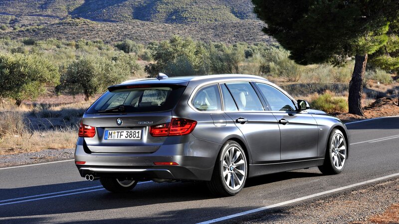 Silver BMW Station Wagon — Gray, Serene, Afternoon