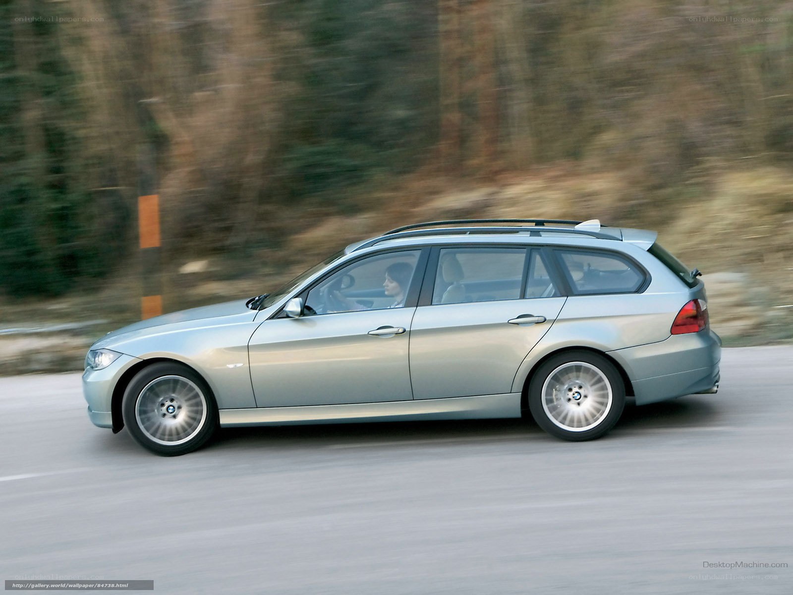 silver bmw station wagon in motion