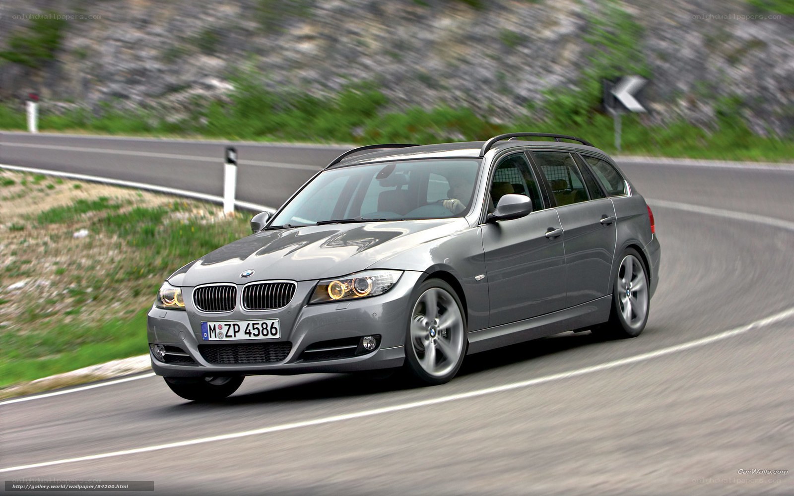 silver bmw station wagon on road