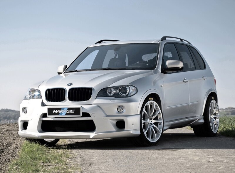 silver bmw suv on road