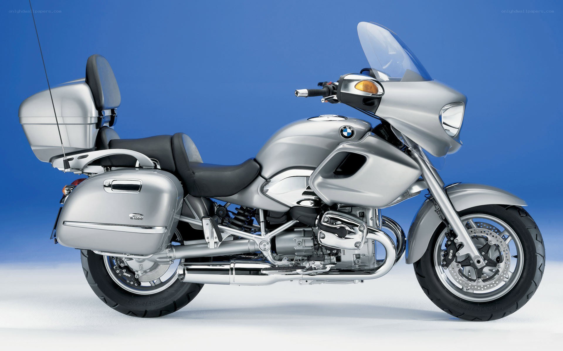 silver BMW touring motorcycle