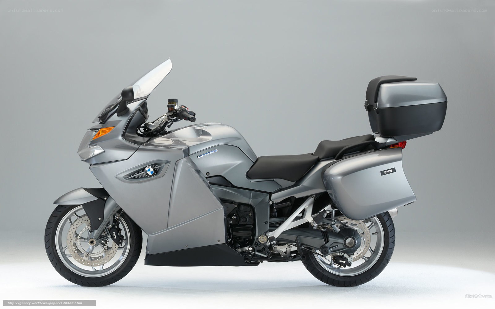 silver bmw touring motorcycle