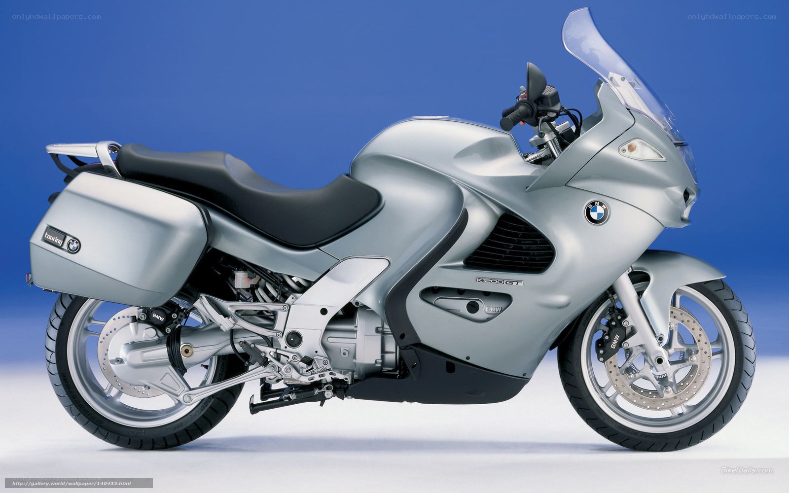 silver bmw touring motorcycle