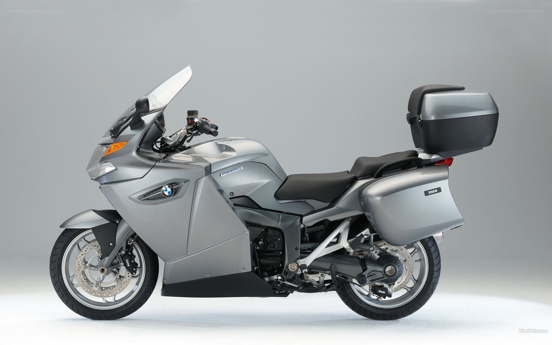 silver bmw touring motorcycle