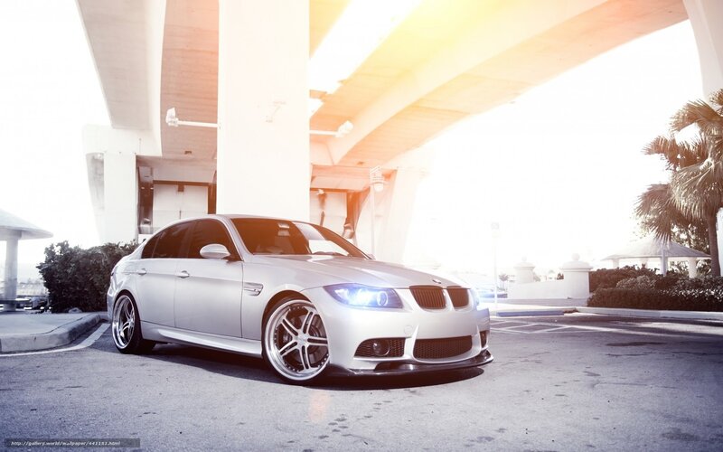 silver bmw under overpass
