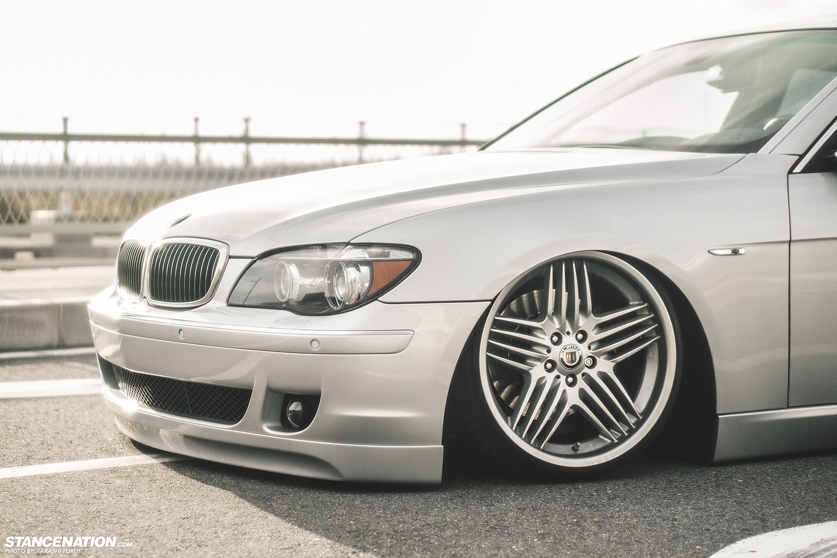 silver bmw with custom wheels