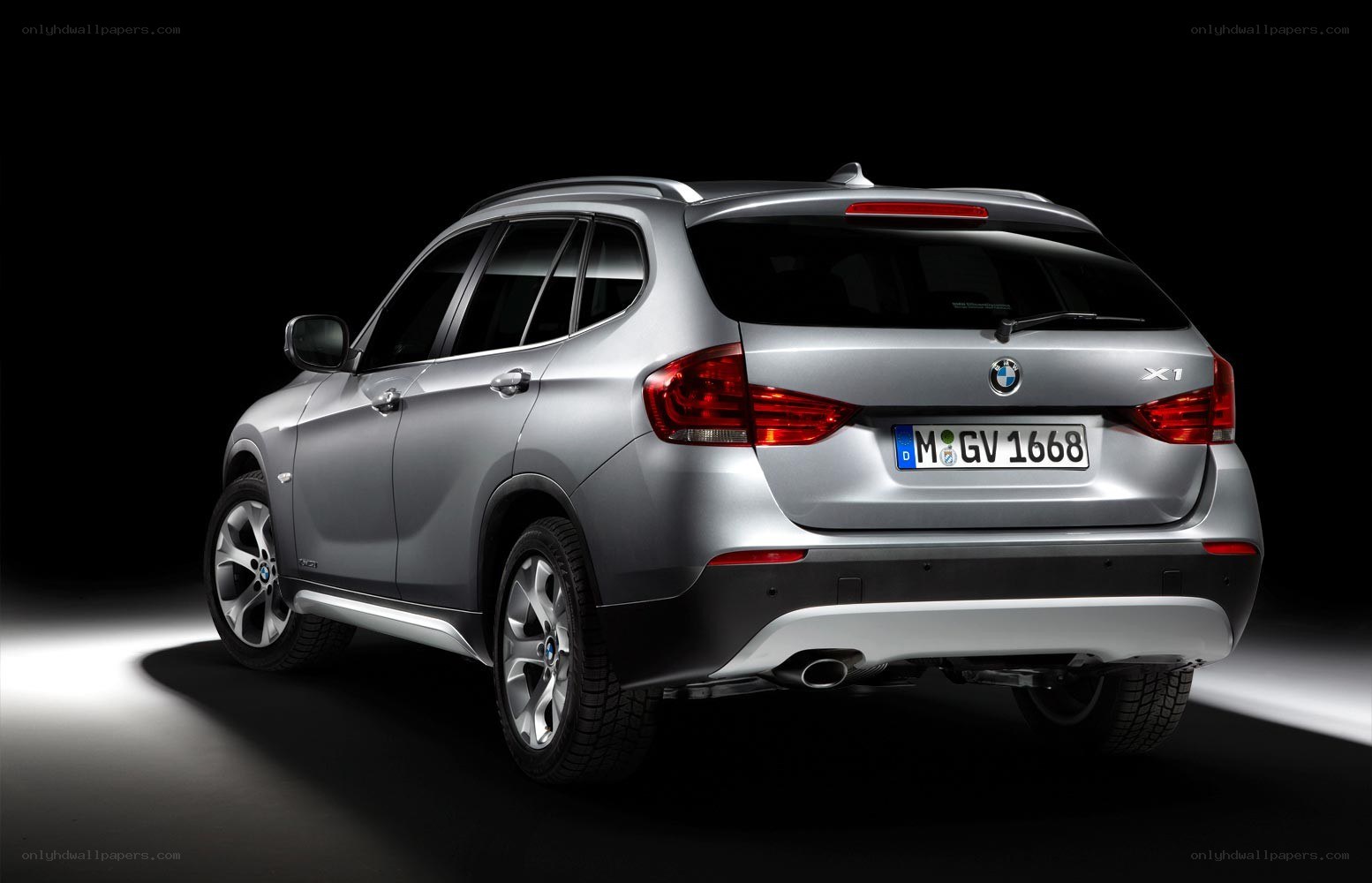 Silver BMW X1 rear view