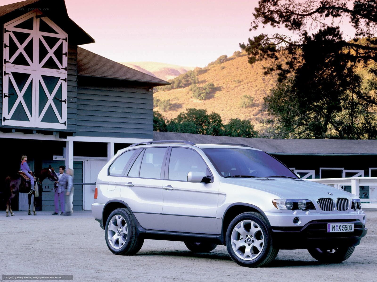 Silver BMW X5 at a ranch