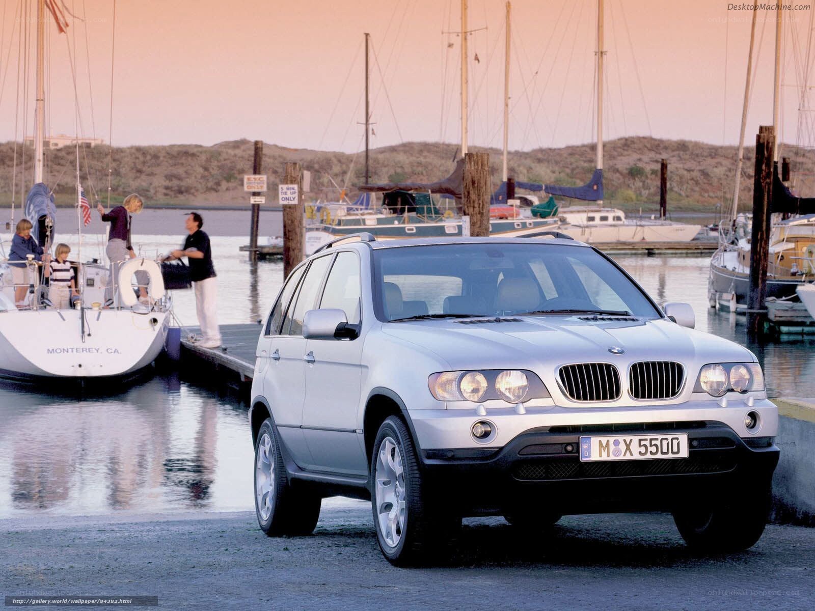 Silver BMW X5 at marina