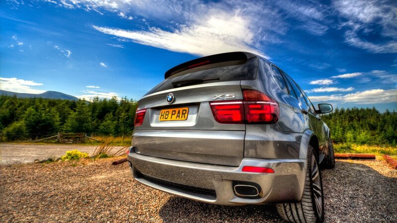 Silver BMW X5 — Blue