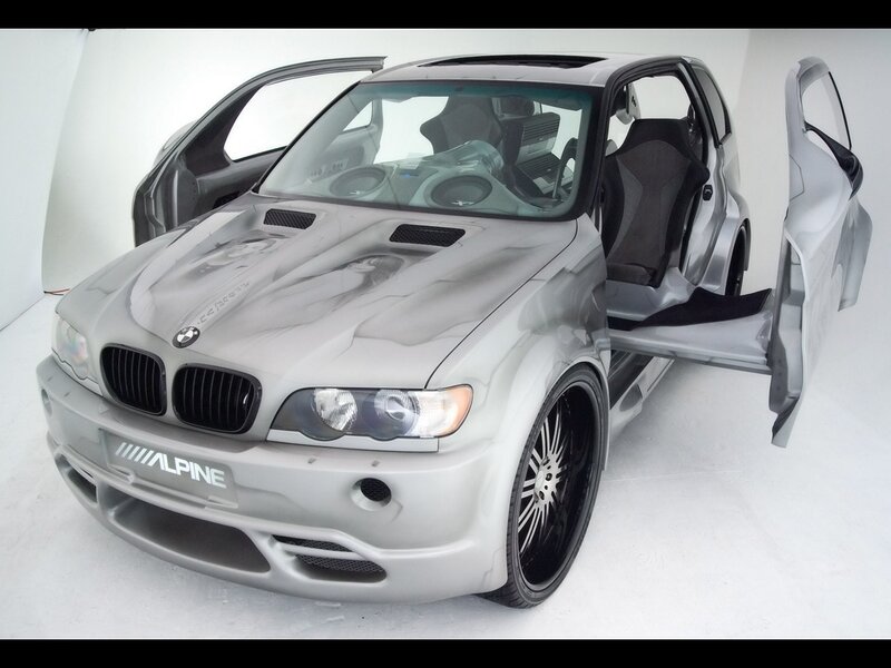 silver bmw x5 with open doors