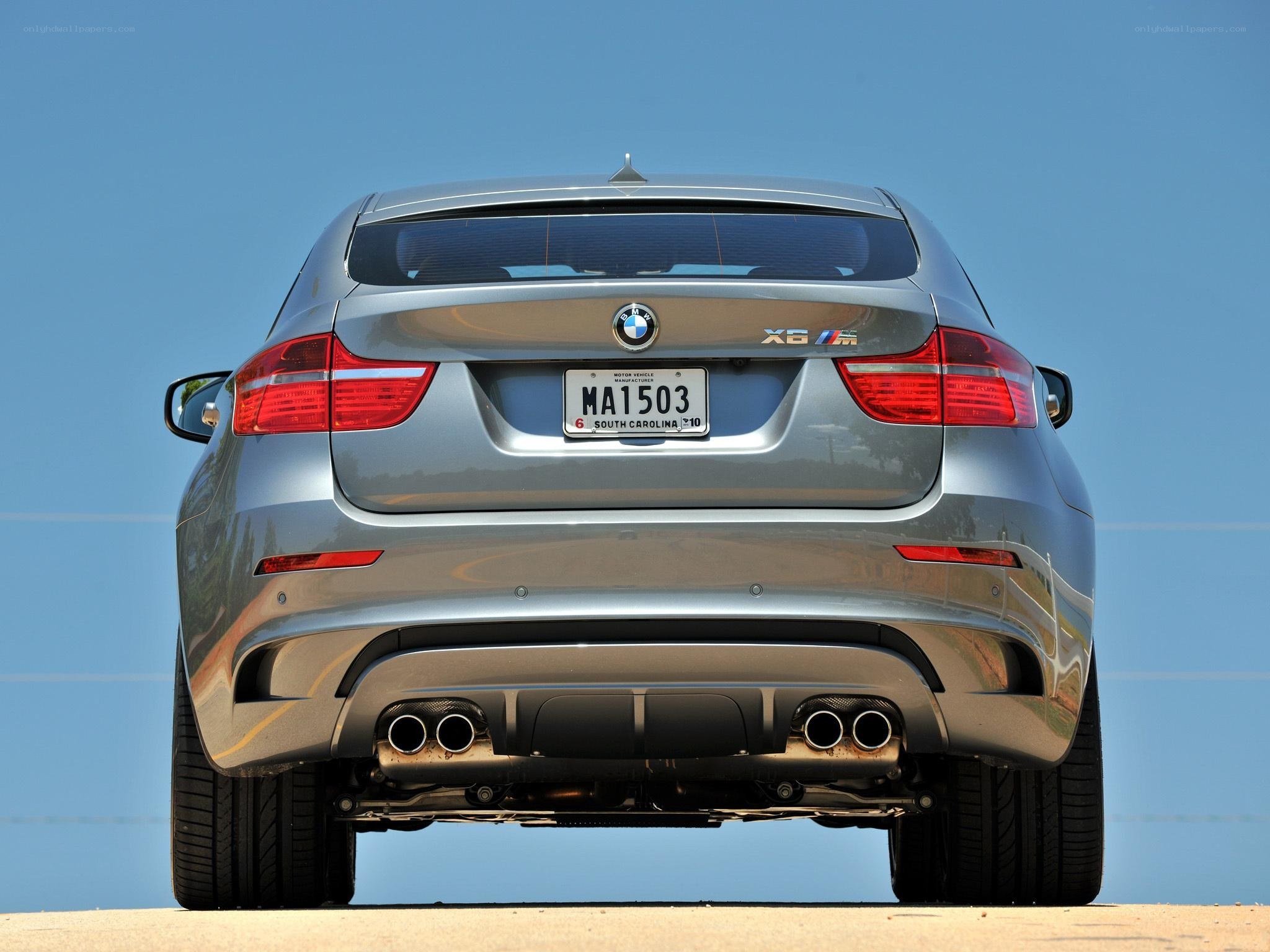 silver bmw x6 m rear view