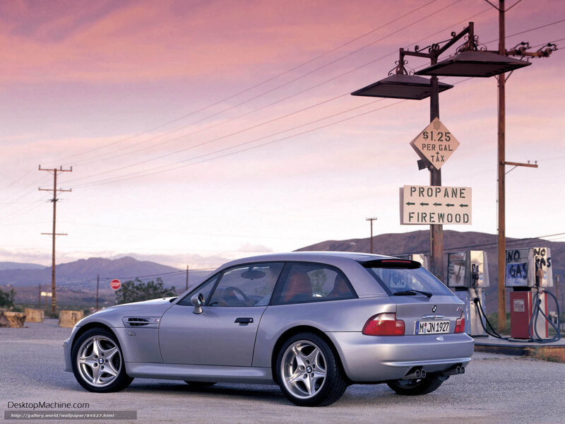 Silver BMW Z3 at gas station
