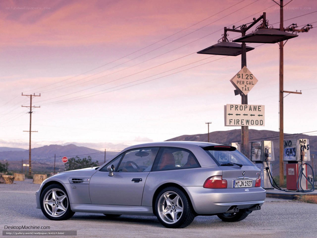 Silver BMW Z3 at gas station