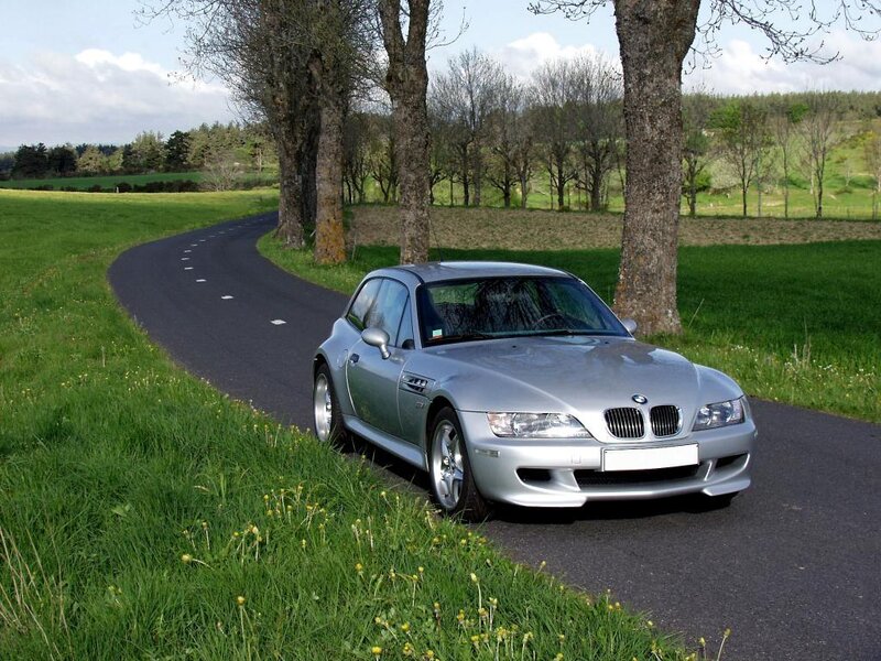 Silver BMW Z3 parked on a country road