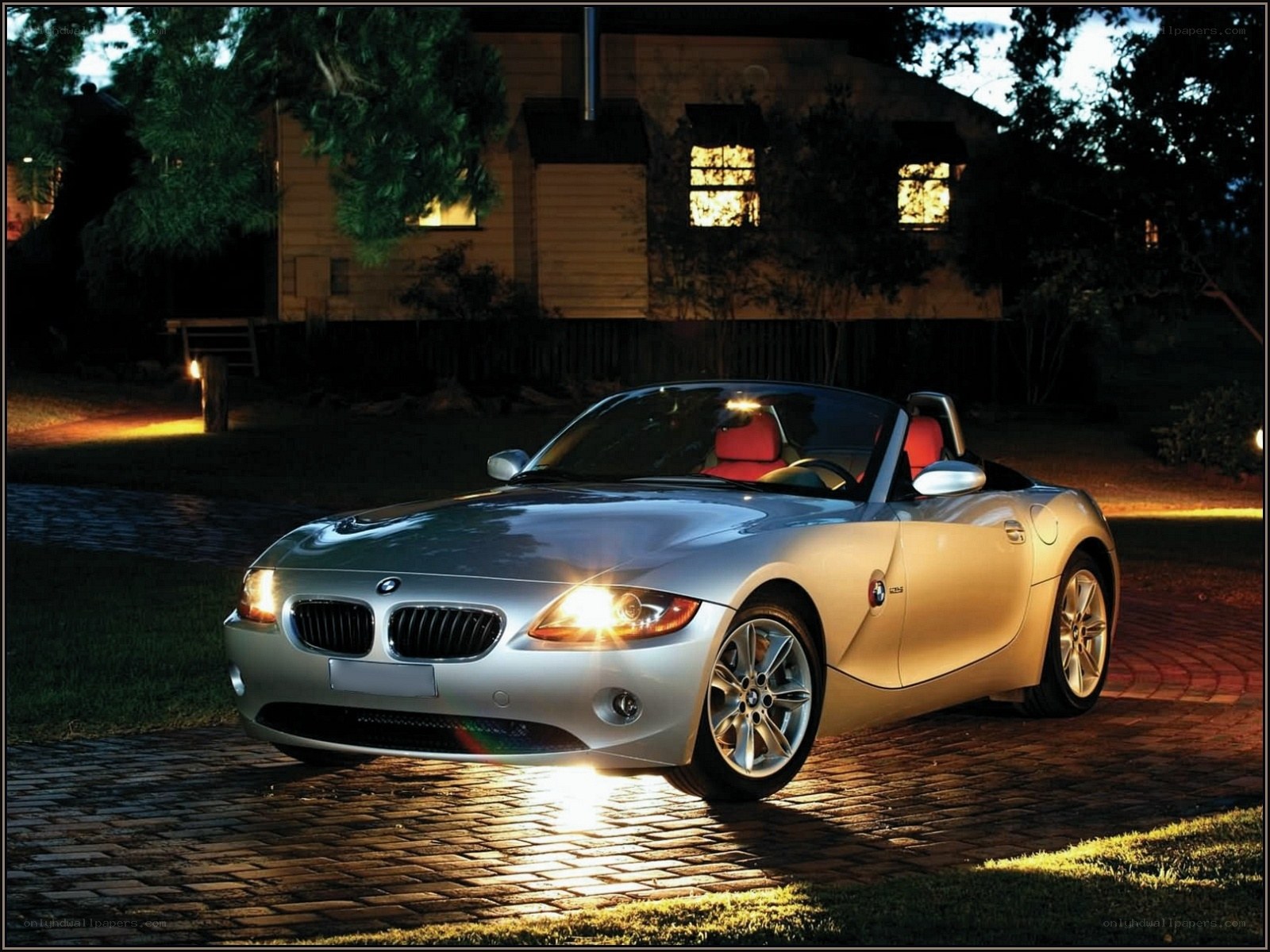 Silver BMW Z4 at night