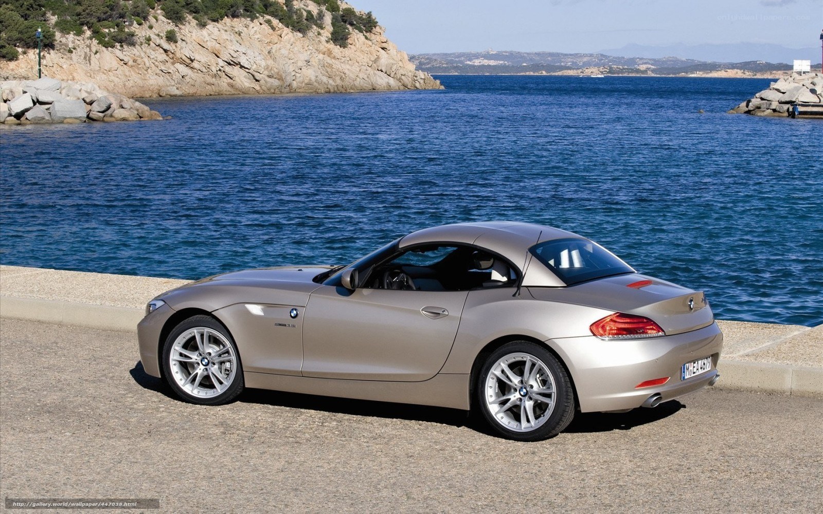 Silver BMW Z4 by the sea