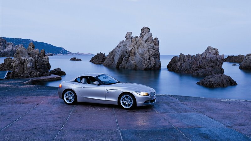Silver BMW Z4 by the sea