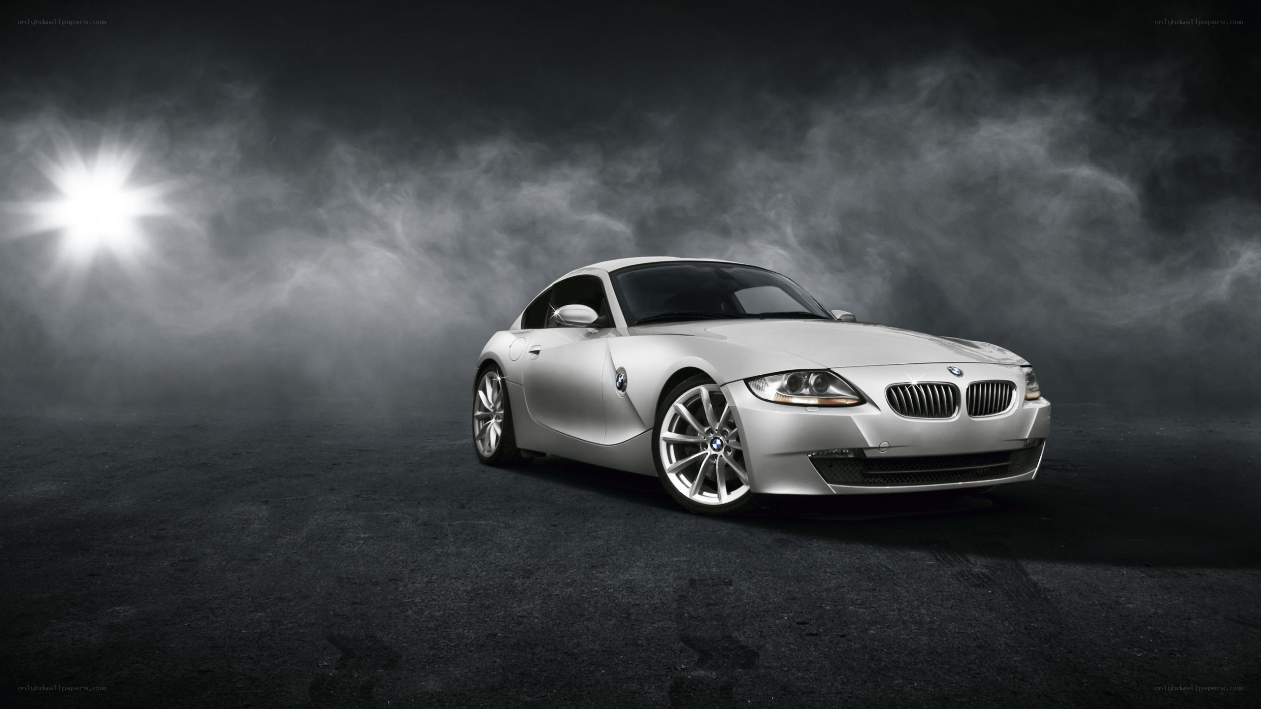 Silver BMW Z4 in dramatic lighting
