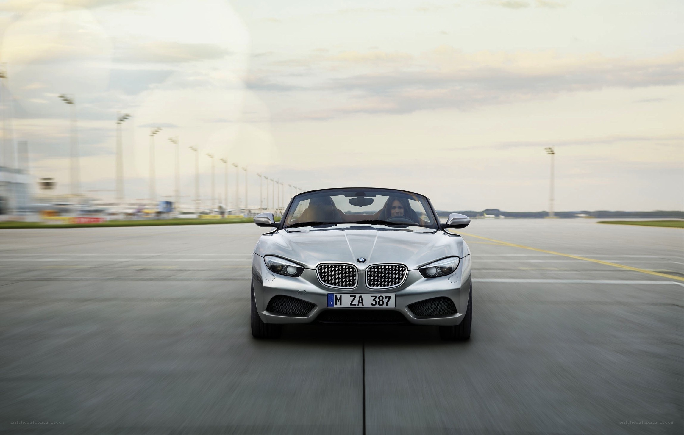 Silver BMW Z4 on a runway