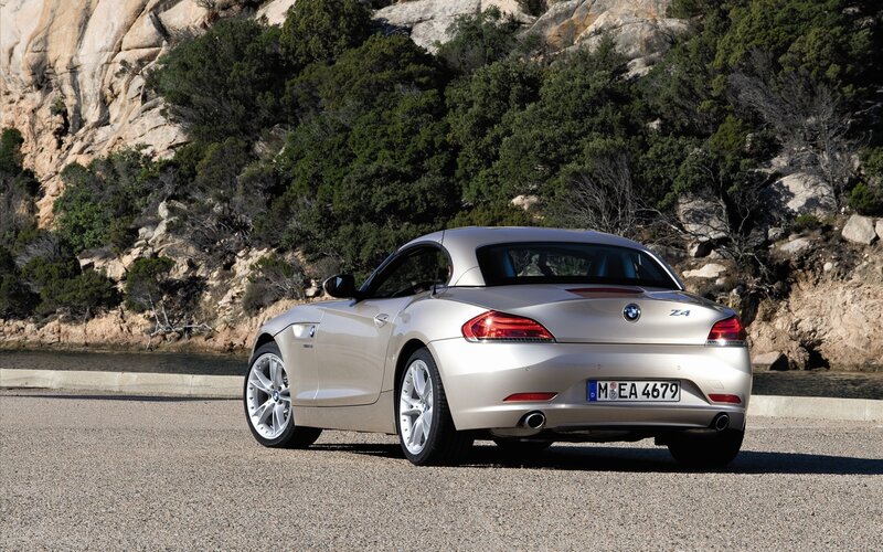Silver BMW Z4 on coastal road