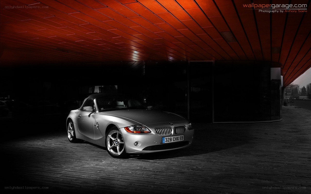 Silver BMW Z4 under red canopy