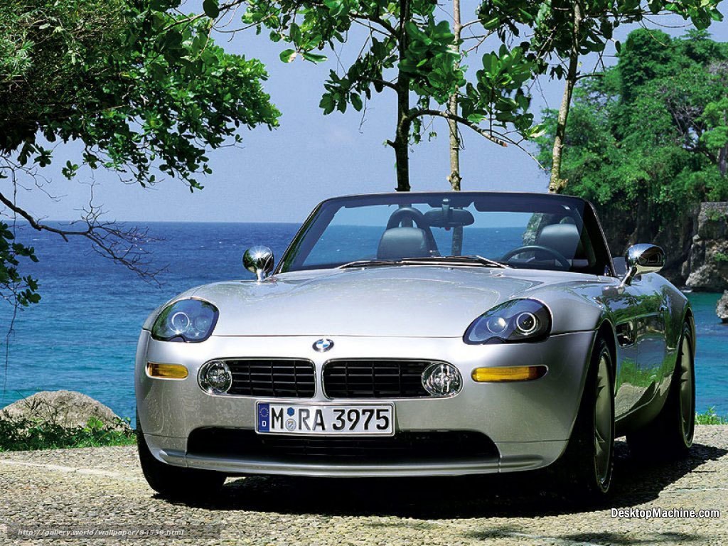 Silver BMW Z8 by the sea