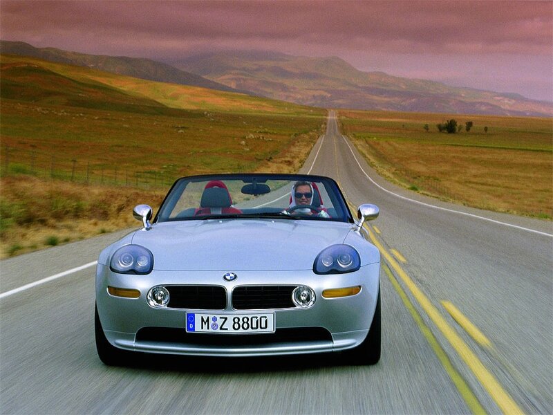 Silver BMW Z8 on a country road