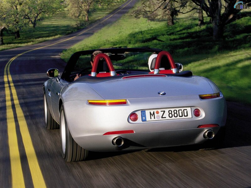 Silver BMW Z8 on a country road