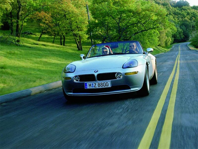 Silver BMW Z8 on a country road
