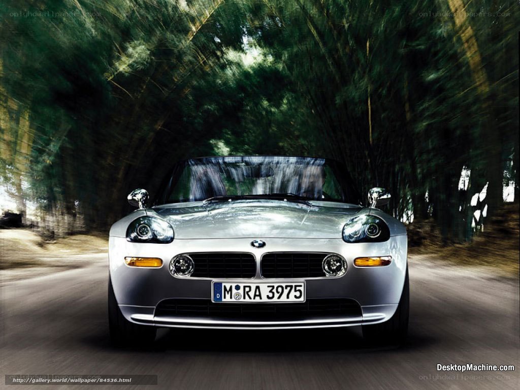 Silver BMW Z8 on a forest road