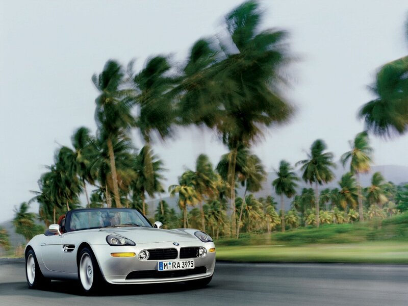 Silver BMW Z8 on a tropical road