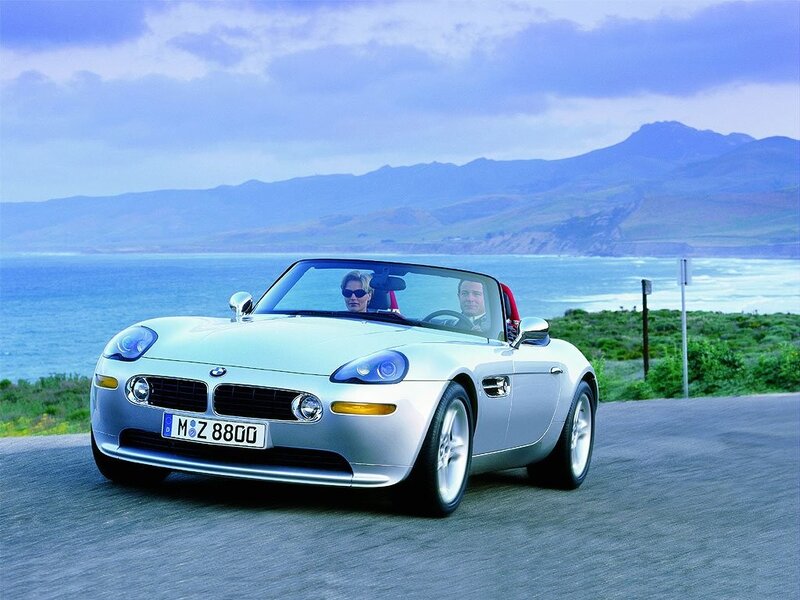 Silver BMW Z8 on coastal road