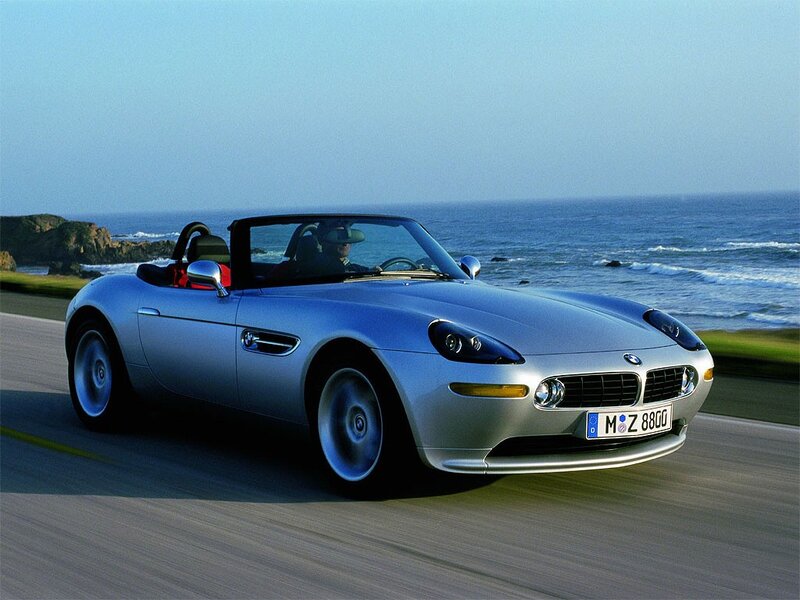 Silver BMW Z8 on coastal road