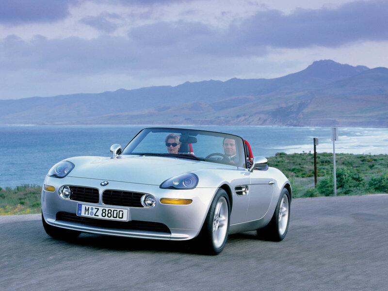Silver BMW Z8 on coastal road