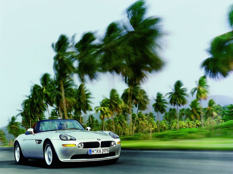Silver BMW Z8 on tropical road
