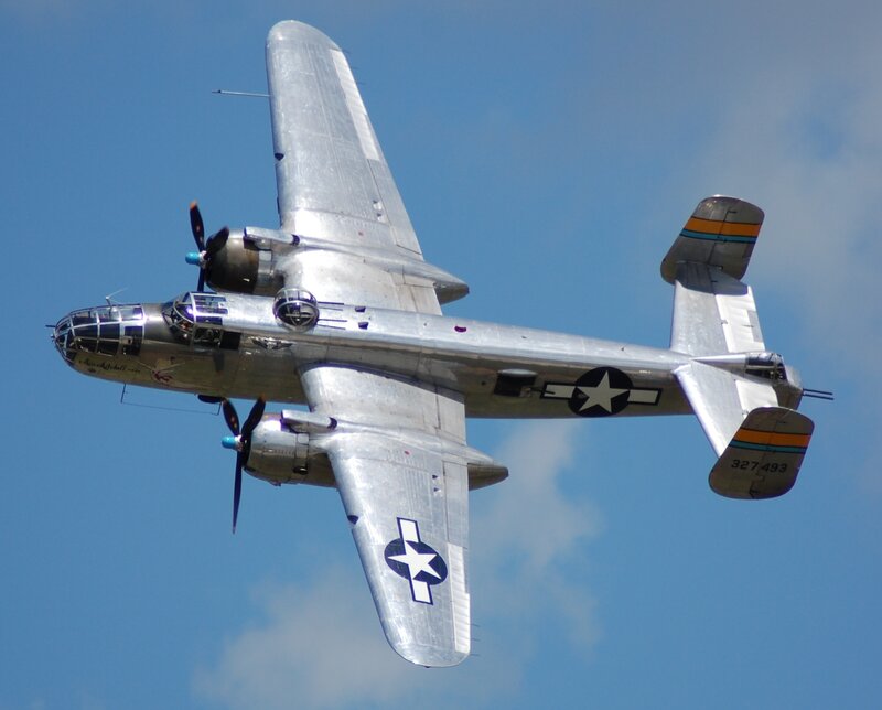 Silver Bomber Aircraft — Blue, Clear, Dynamic