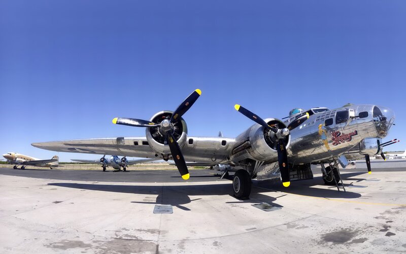 Silver Bomber Aircraft — Clear, Afternoon, Photograph