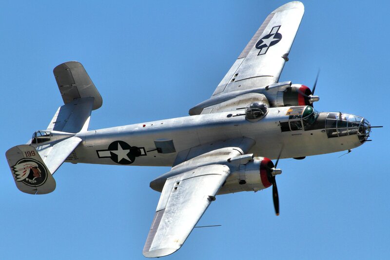 Silver Bomber Aircraft — Clear, Afternoon