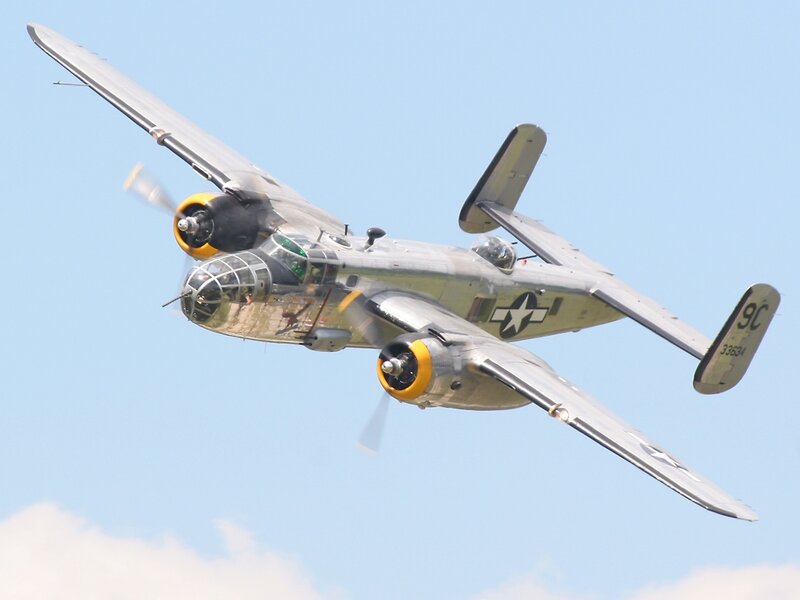 Silver Bomber Aircraft — Gray, Calm, Afternoon, Photograph, Propellers