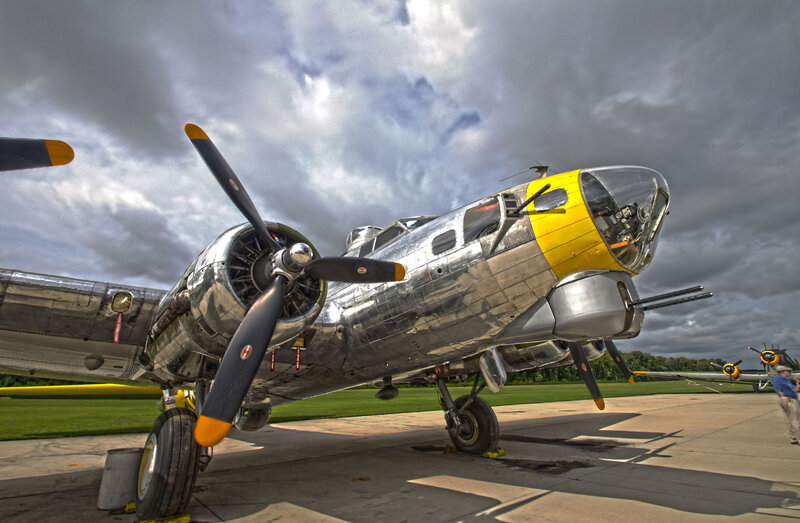 Silver Bomber Aircraft — Gray, Dramatic, Afternoon
