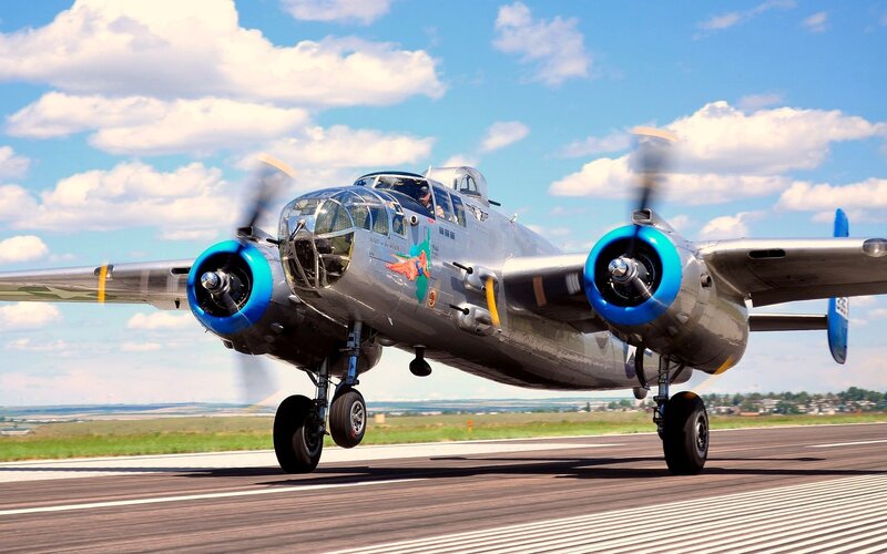 Silver Bomber Aircraft — Gray, Dynamic, Afternoon
