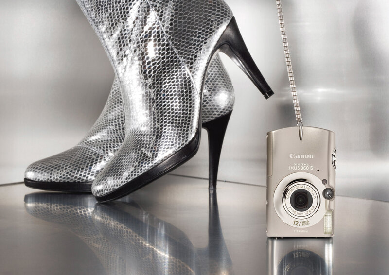 silver boots and camera