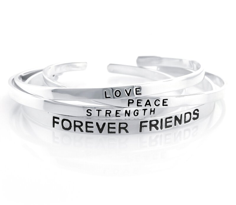 silver bracelets with engraved words