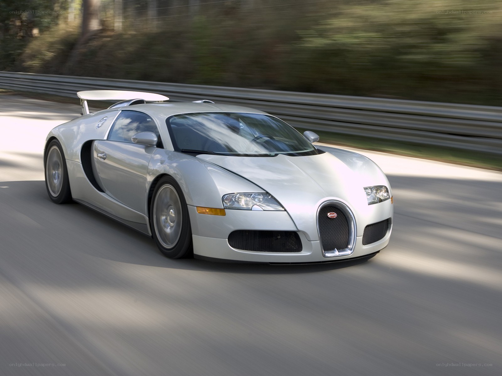 silver bugatti veyron in motion