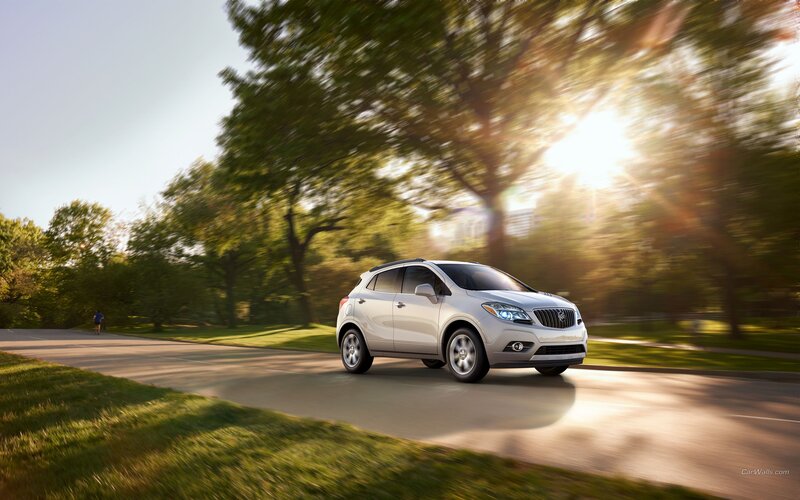 silver buick in motion