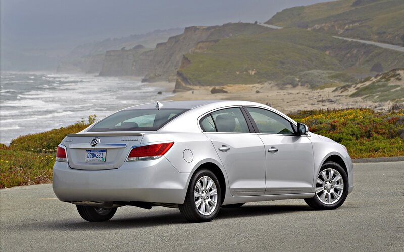silver buick lacrosse by the coast