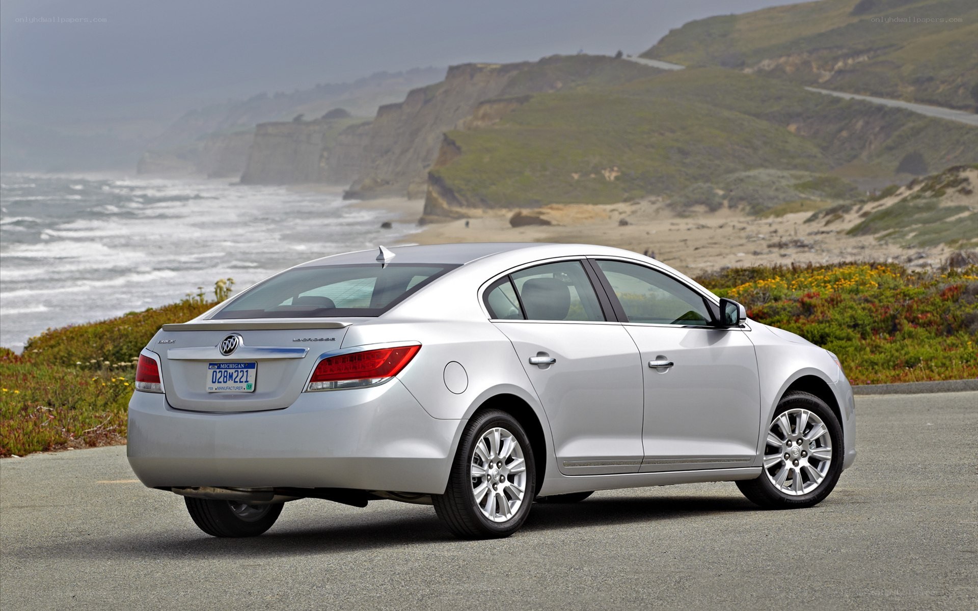 silver buick lacrosse by the coast