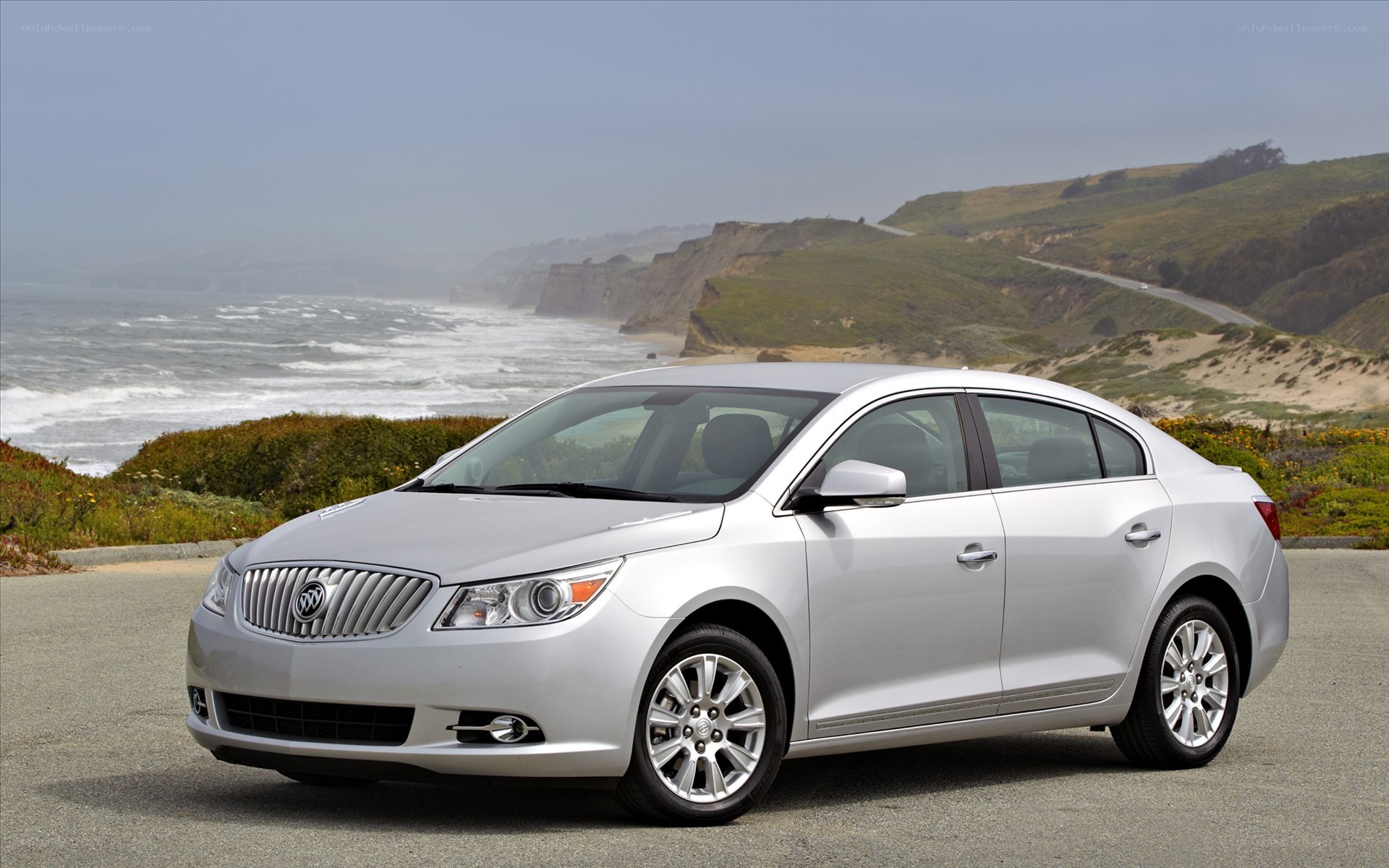 Silver Buick LaCrosse by the coast