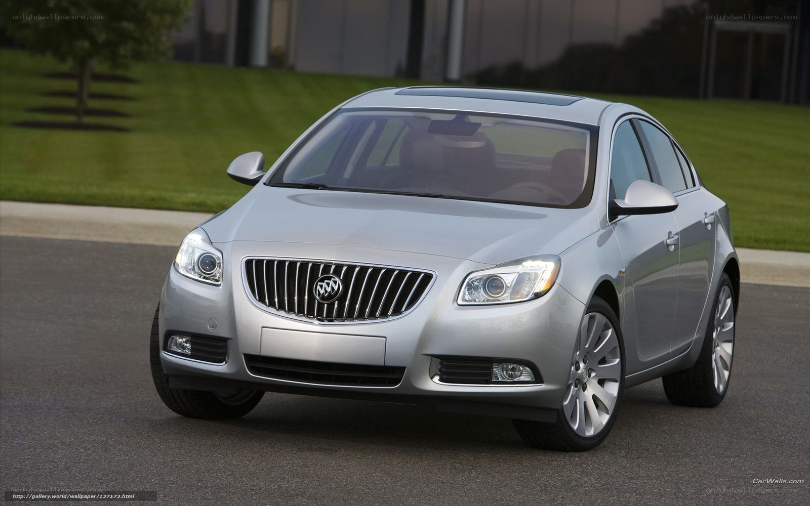 silver buick sedan on pavement